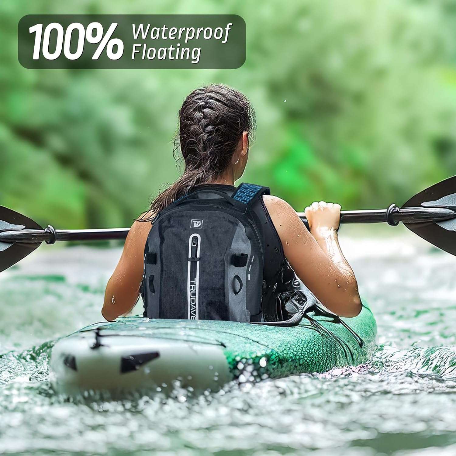 alt="Woman floating on water wearing Trudave FloatPack Series 30L black waterproof fishing backpack showing 100% submersible design and durable roll-top closure for outdoor and boating adventures"
